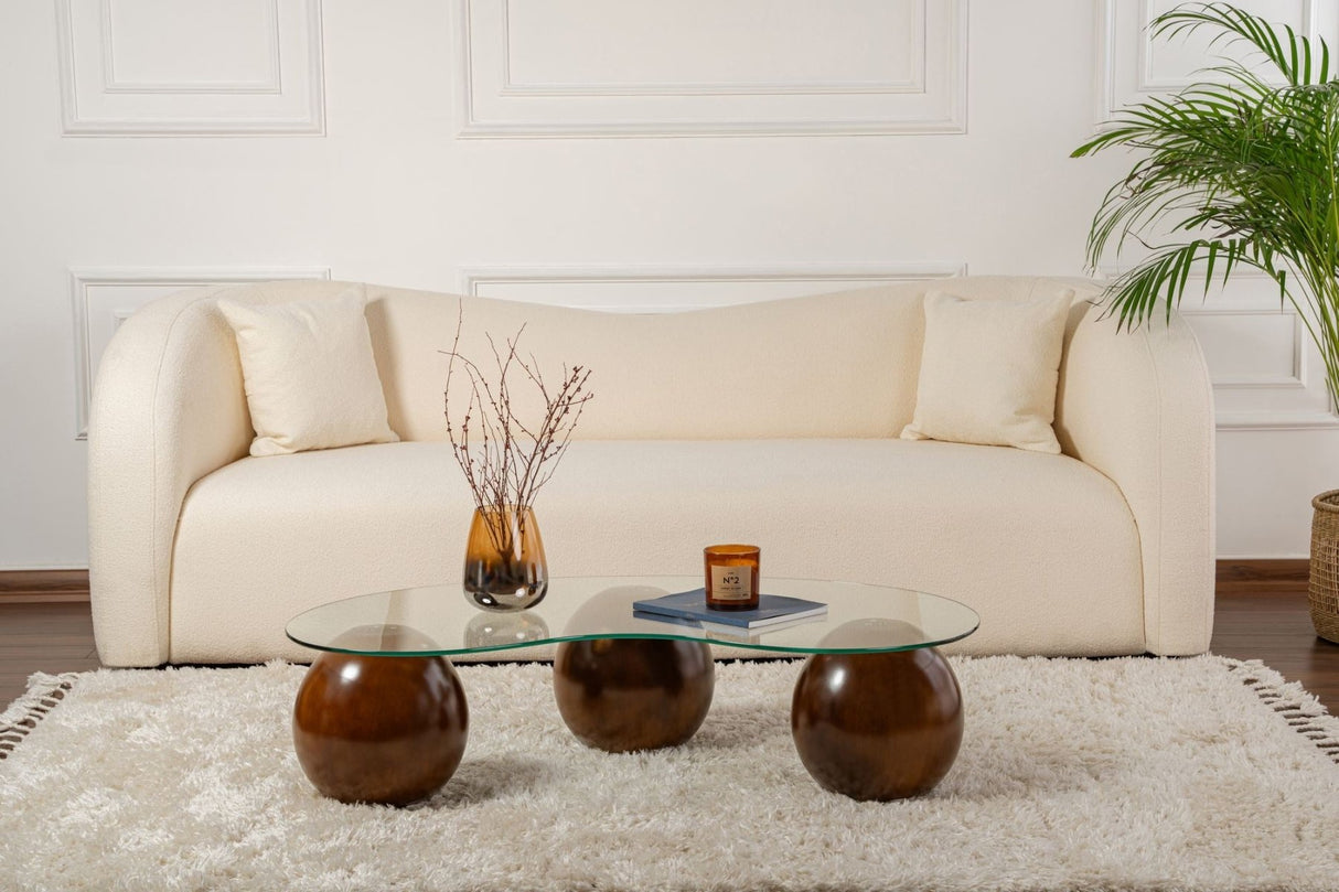 Organische salontafel transparant glas walnoot bolpoten Sphere 120x70 cm