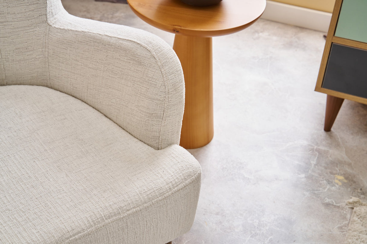Sillón moderno tejido de lino beige con pata alta Revos