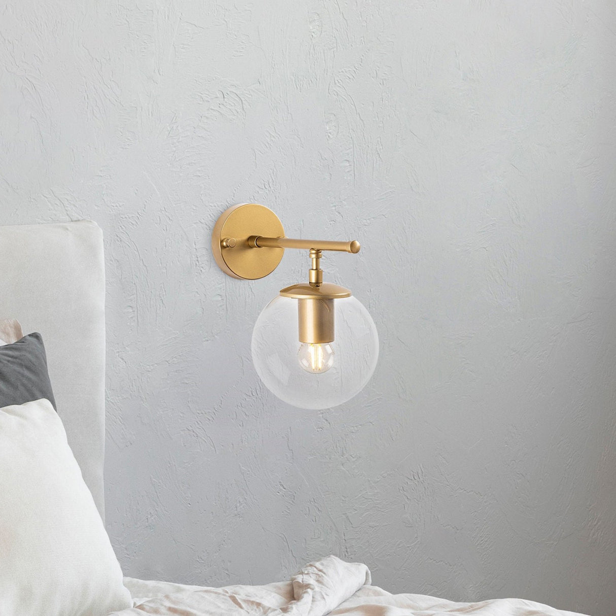 Aplique de pared dorado con vidrio claro Obsidiana