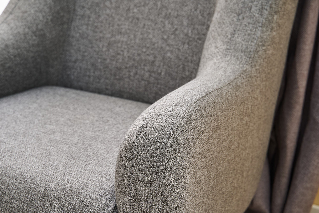 Sillón moderno de tela de lino gris con pata alta Revos