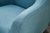 Sillón moderno tejido lino turquesa con pata alta Revos