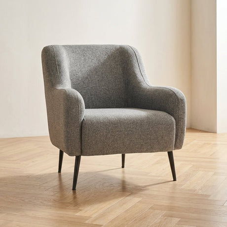 Sillón Revos Grey foto atmosférica en un interior moderno.