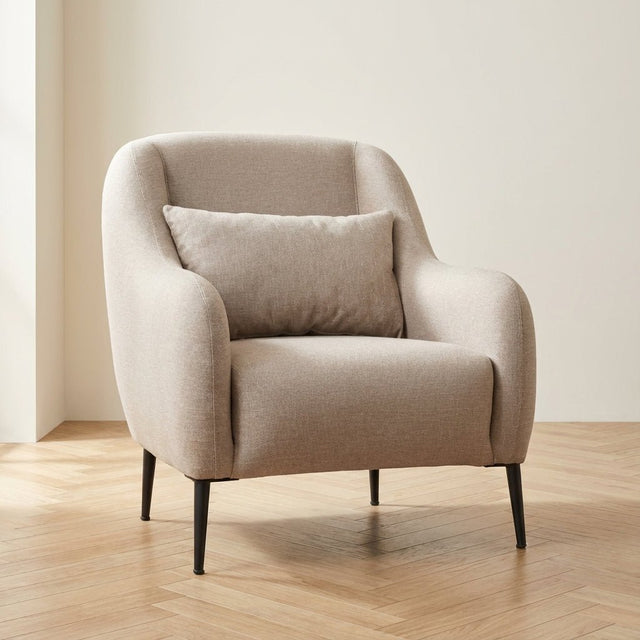 Sillón Venus Crema foto atmosférica en un interior moderno