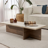 Moderna mesa de centro rectangular con tapa de travertino y base de melamina de nogal. Dimensiones: 120 x 45 x 30 cm.