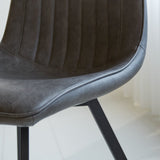 Silla de comedor Jimmy Polipiel Dimehouse Antracita L x An x Al 75x57x51 Cuero sintético Detalle fotográfico atmosférico