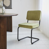 Silla de comedor Remo tejido canalé Dimehouse Verde L x An x Al 56x55x52 Tela acanalada Vista frontal diagonal de fotografía atmosférica