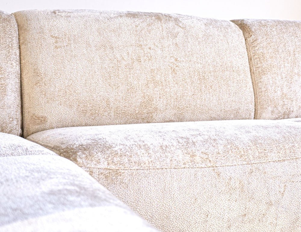 Sofá Chloe DeGeBe Tela beige Detalle fotográfico atmosférico
