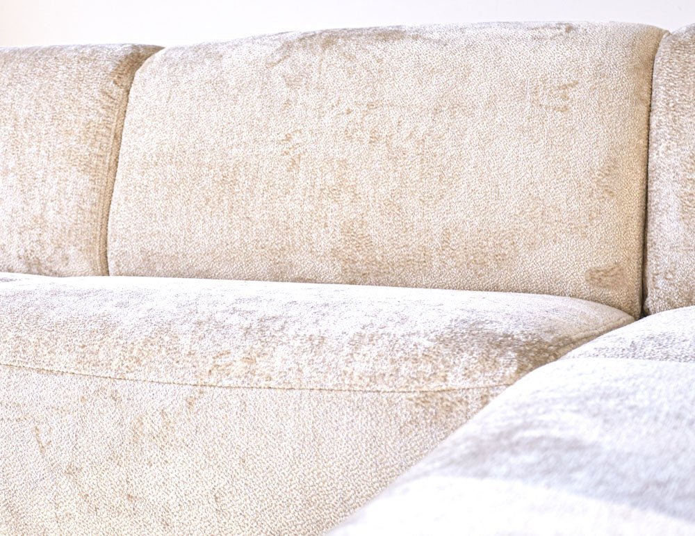 Sofá Chloe DeGeBe Tela beige Detalle fotográfico atmosférico