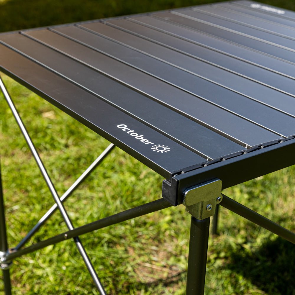 Mesa de camping Plegable aluminio 72x65x51 cm Dimehouse Negro L x An x Al 81x18x18 Aluminio Detalle fotográfico atmosférico